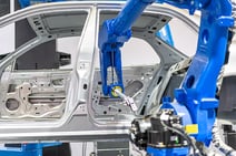 Automotive assembly line with robot welder