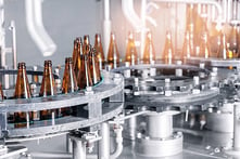 Glass bottles on a filling line